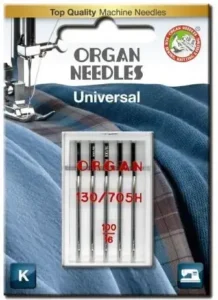 Close-up of sewing machine needle size markings 80/12 and 90/14 on packaging