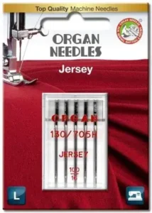 Comparison of universal, ballpoint, and stretch sewing machine needle tips under magnification