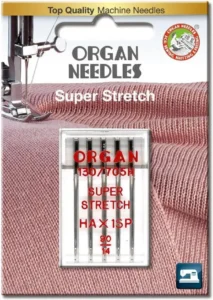 Sewing machine needle inserted incorrectly causing skipped stitches on knit fabric