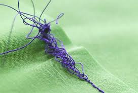 Sewing machine making loops underneath